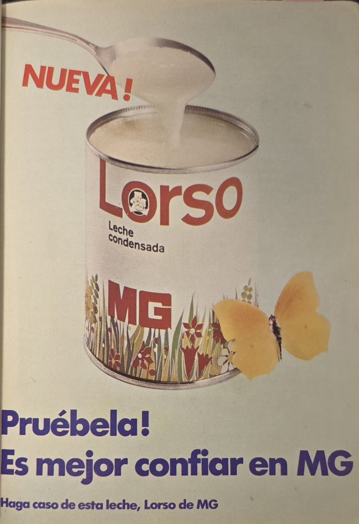 1968 Spanish magazine ad for Lorso condensed milk. A colour photo of a spoon pouring thick white condensed milk into an open can labelled “Lorso Leche condensada MG”, decorated with flowers and grasses and a small bear logo, with a yellow butterfly beside it. Text: “Nueva!” and “Pruébela! Es mejor confiar en MG”.